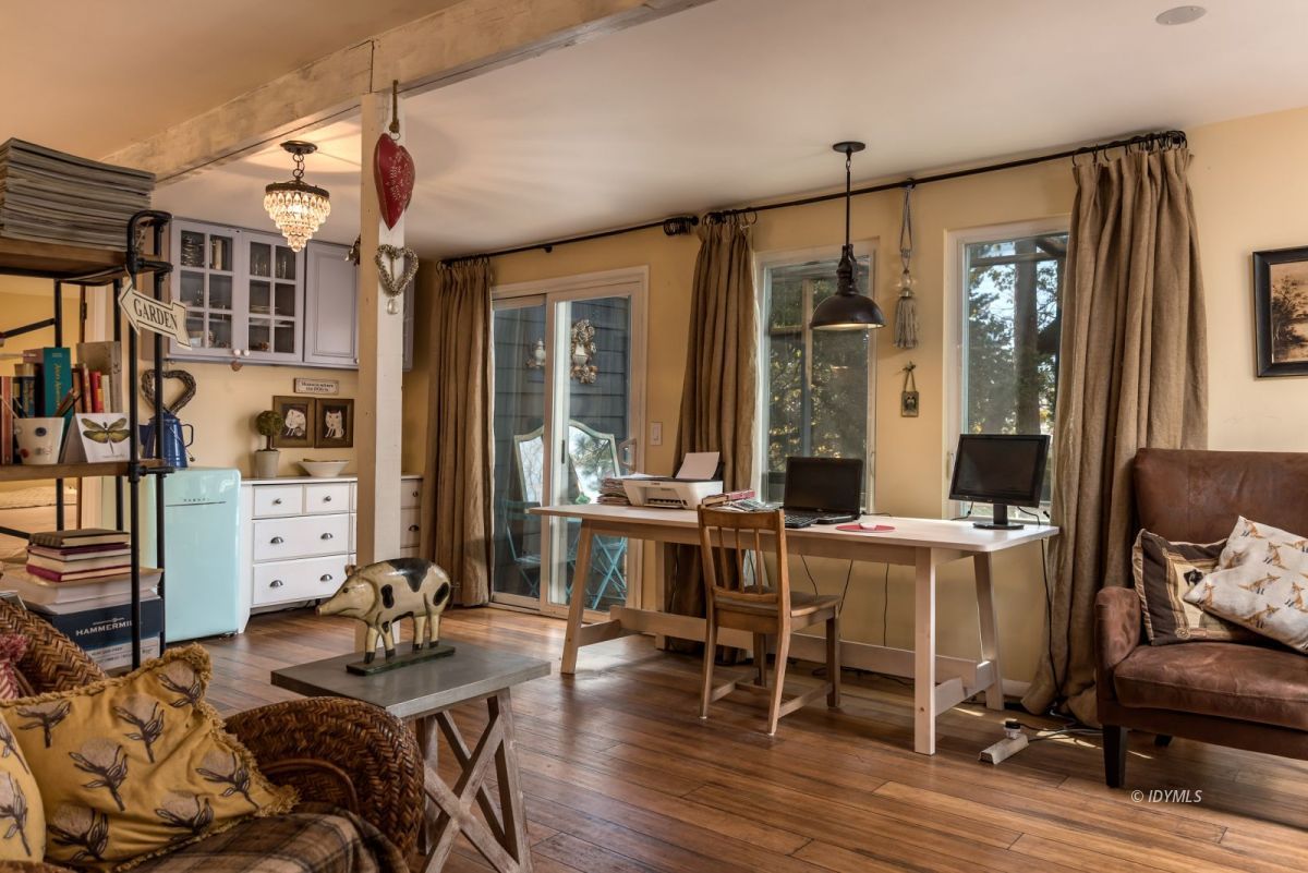 25650 Seneca Road Idyllwild, CA 92549 - Photo 5 of 23 a view of a livingroom with furniture window and wooden floor