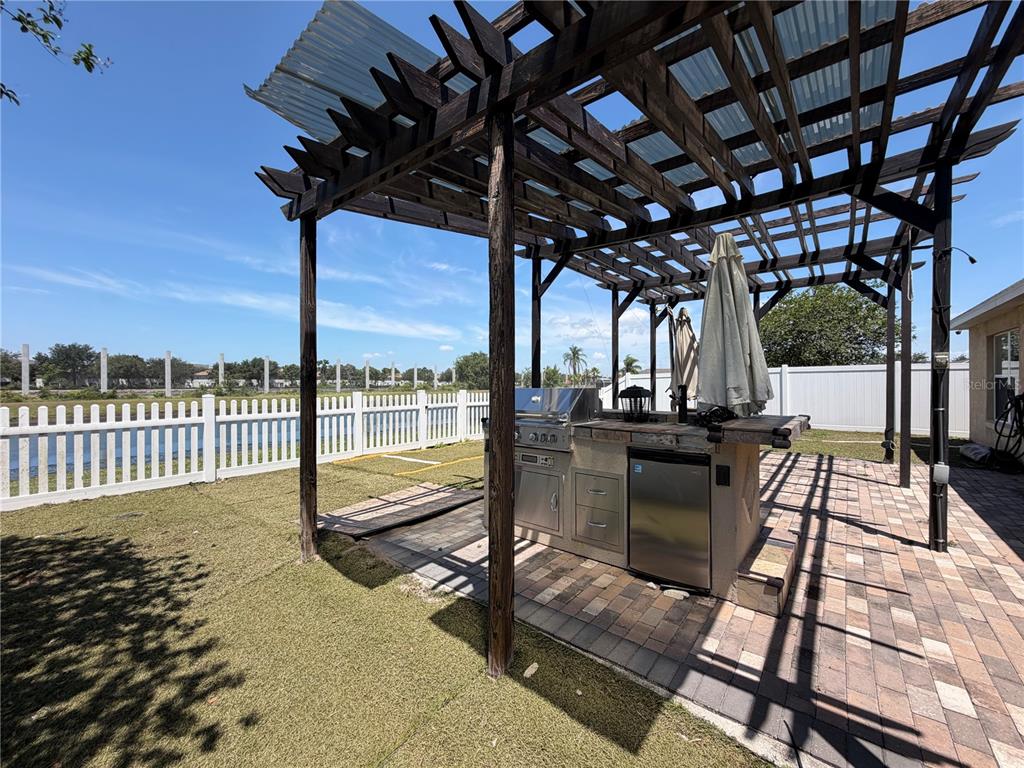 945 Tramells Trail Kissimmee, FL 34744 - Photo 28 of 36 a view of a porch with furniture and yard