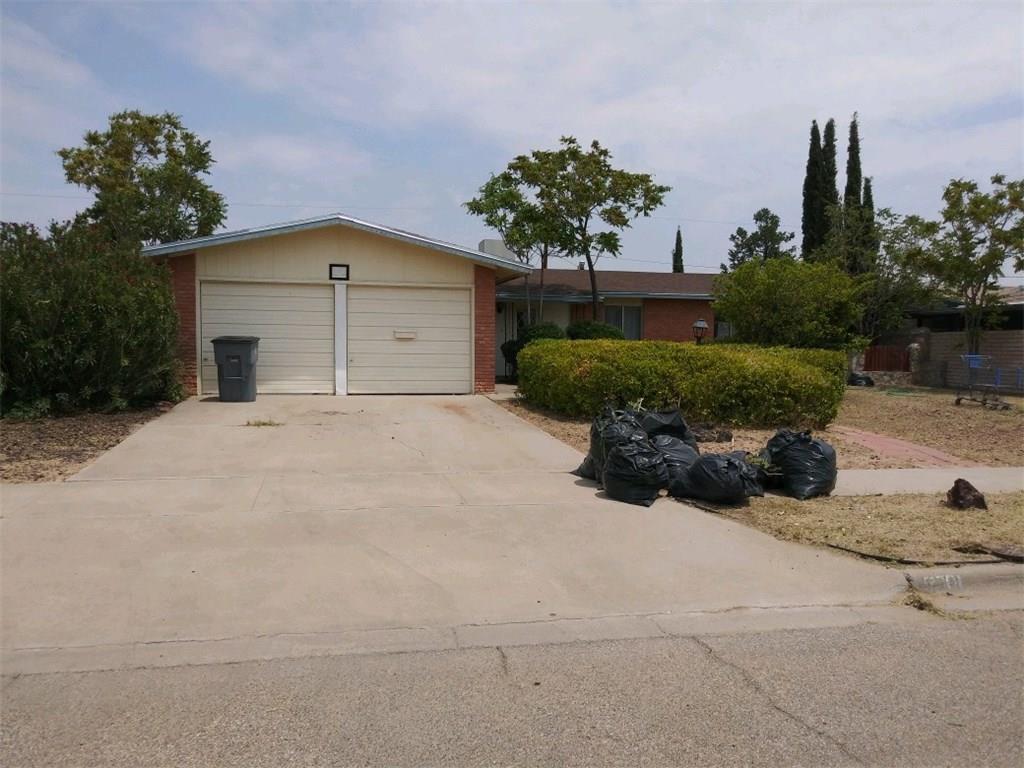 a view of a house with outdoor space and plants