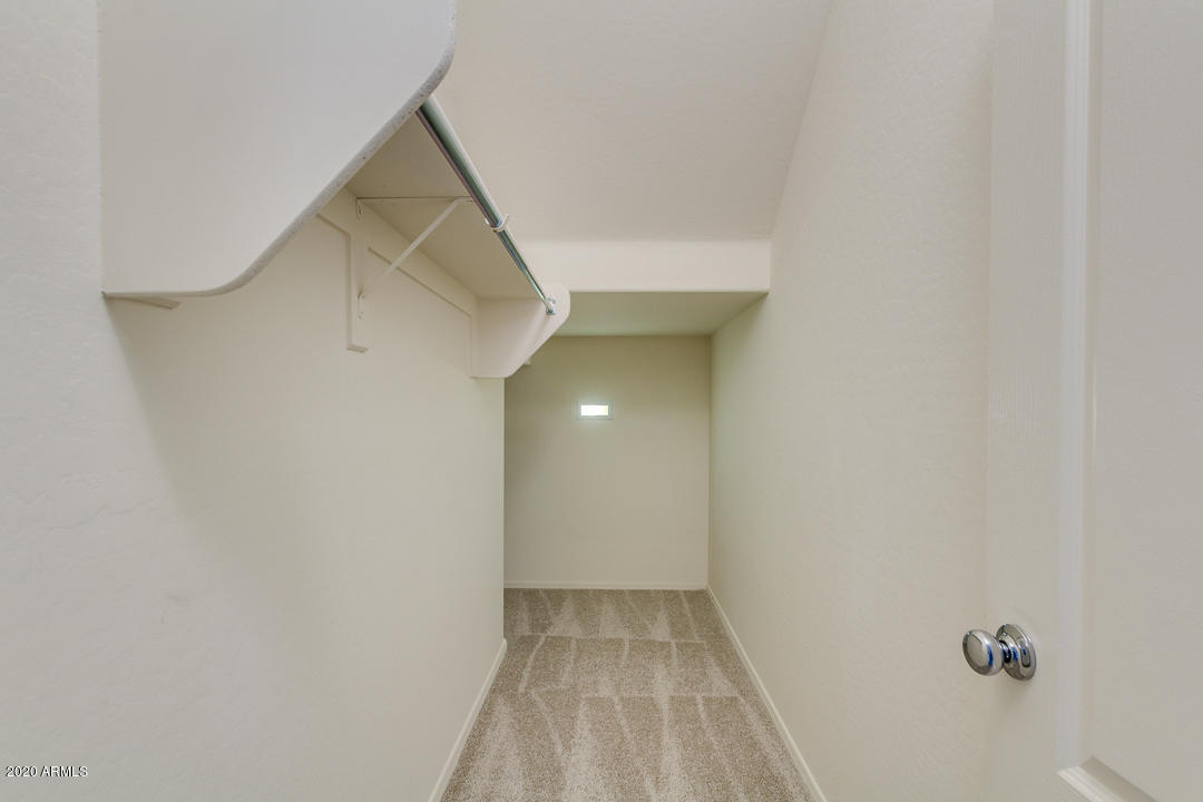 2074 South Moccasin Trail Gilbert, AZ 85295 - Photo 23 of 43 Storage Closet Under Stairs