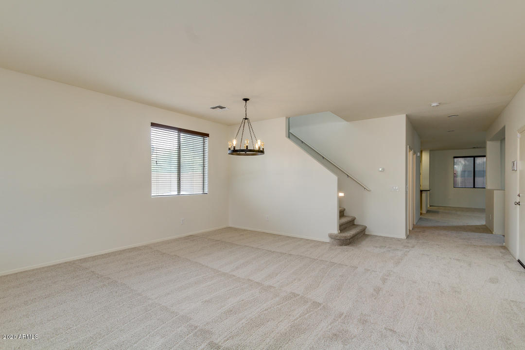 2074 South Moccasin Trail Gilbert, AZ 85295 - Photo 3 of 43 Living, Dining and Stairs