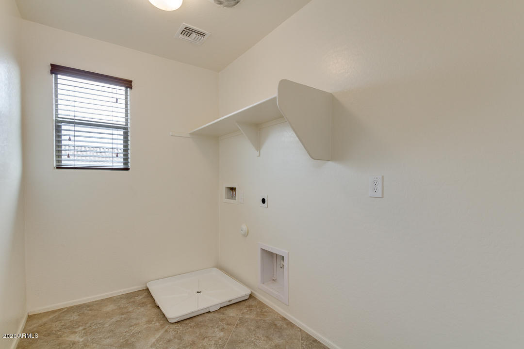 2074 South Moccasin Trail Gilbert, AZ 85295 - Photo 38 of 43 Upstairs Laundry