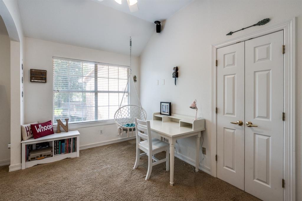 707 Bent Tree Court Coppell, TX 75019 - Photo 19 of 39 a view of a workspace with furniture and a window