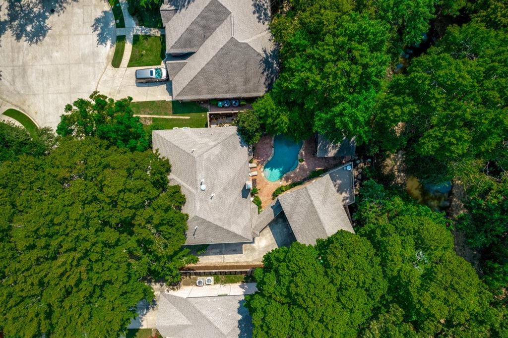 707 Bent Tree Court Coppell, TX 75019 - Photo 37 of 39 an aerial view of a house with a yard and tree s