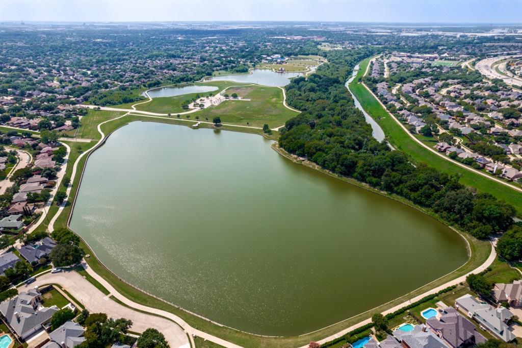 707 Bent Tree Court Coppell, TX 75019 - Photo 38 of 39 an aerial view of a residential houses with outdoor space and swimming pool