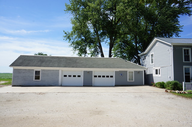 3-s015 Dauberman Road Elburn, IL 60119 - Photo 12 of 15 a front view of a house with a garden