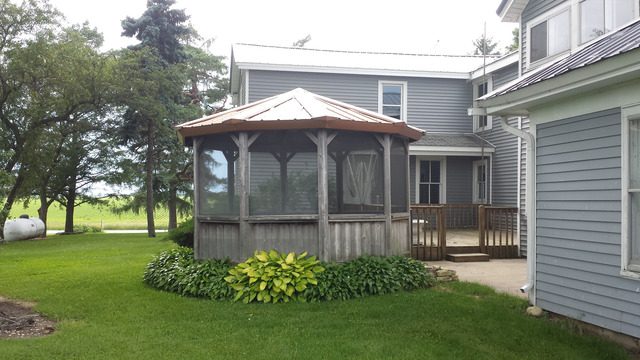 3-s015 Dauberman Road Elburn, IL 60119 - Photo 10 of 15 a front view of a house with garden