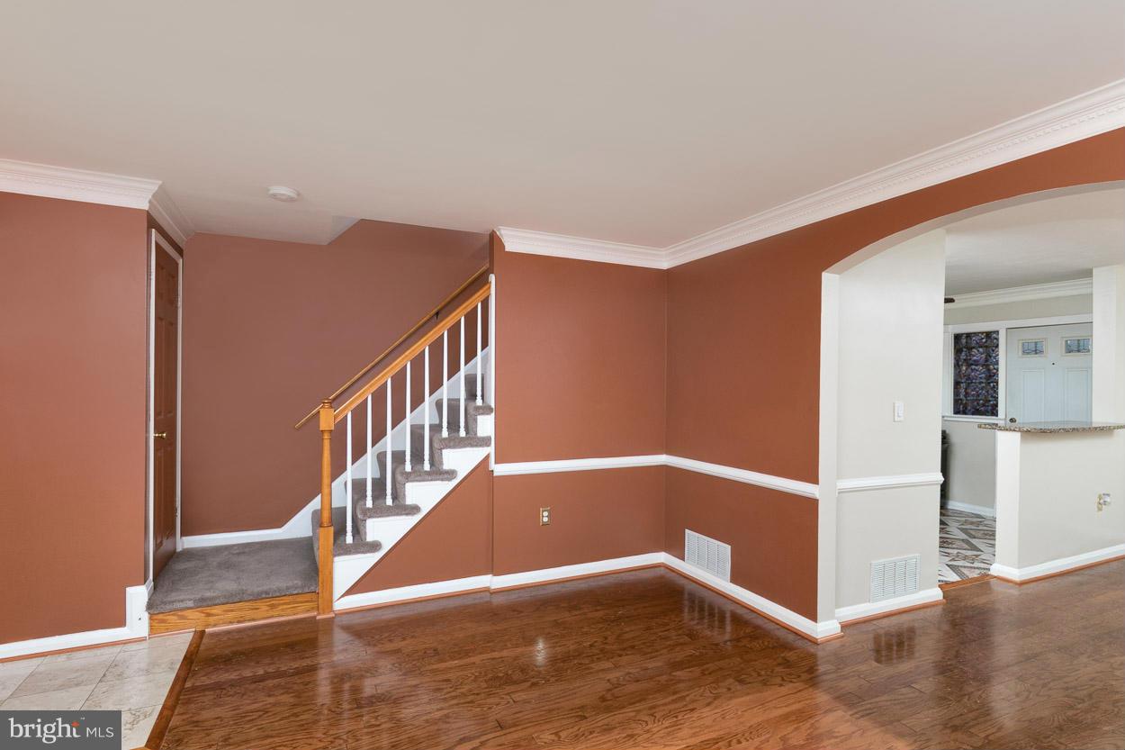 573 Brisbane Road Baltimore, MD 21229 - Photo 11 of 30 a view of entryway with wooden floor