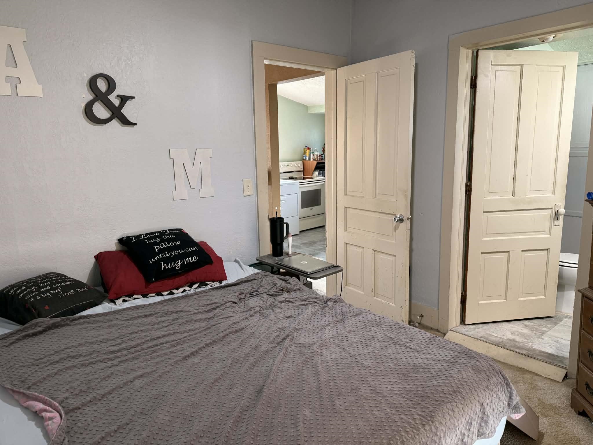 505 East Main Street Durand, IL 61024 - Photo 11 of 18 a bedroom with a bed and a window