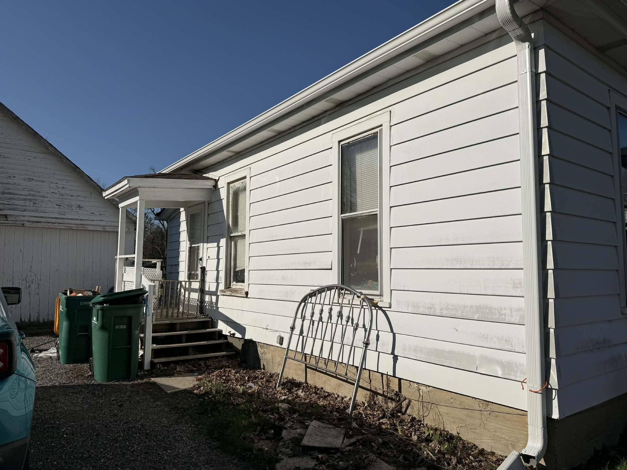 505 East Main Street Durand, IL 61024 - Photo 17 of 18 a view of a house with wooden fence