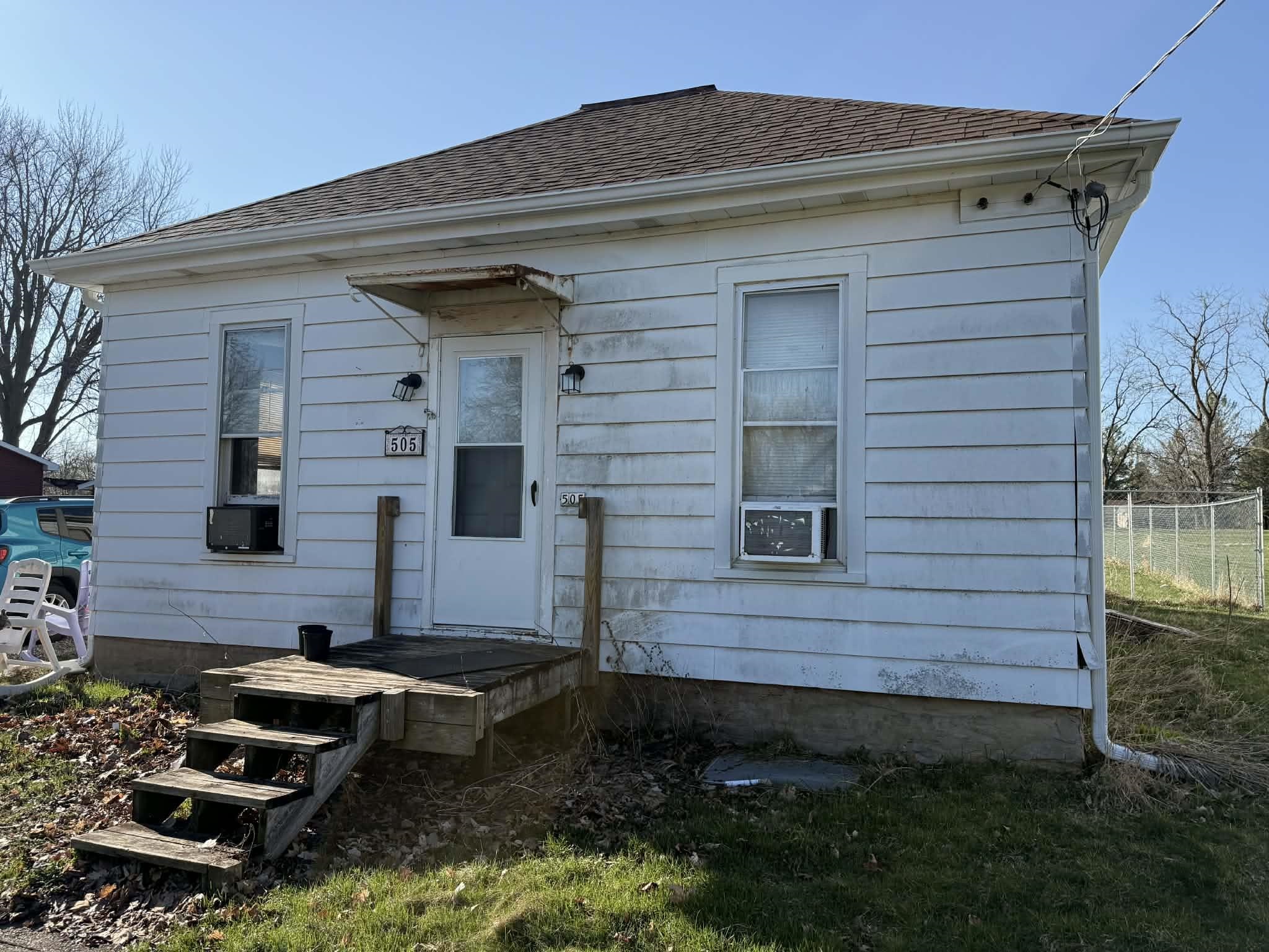 505 East Main Street Durand, IL 61024 - Photo 2 of 18 a front view of a house with garden