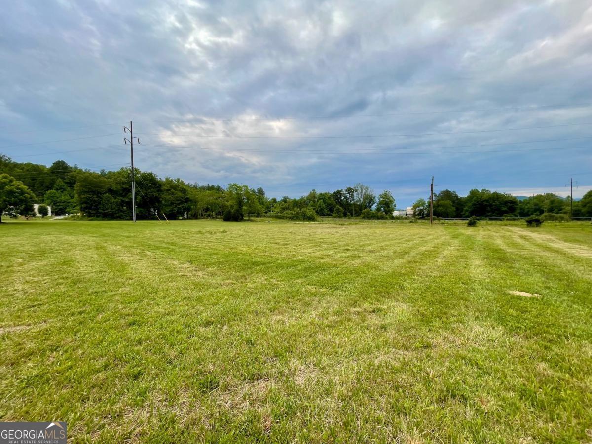 a view of a building with a yard