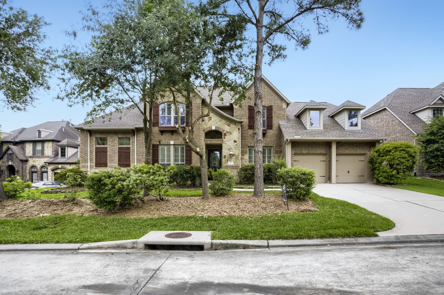11 Spotted Lily Way The Woodlands, TX 77354 - Photo 1 of 30 front view of house with a yard