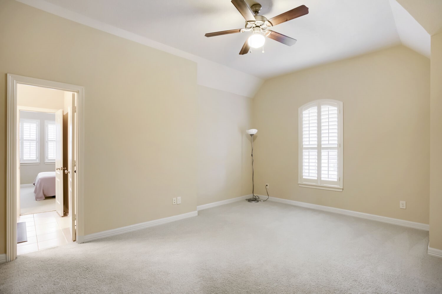 11 Spotted Lily Way The Woodlands, TX 77354 - Photo 17 of 30 an empty room with windows and fan