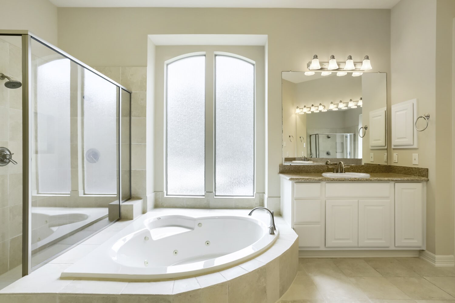 11 Spotted Lily Way The Woodlands, TX 77354 - Photo 20 of 30 a bathroom with a tub sink and mirror