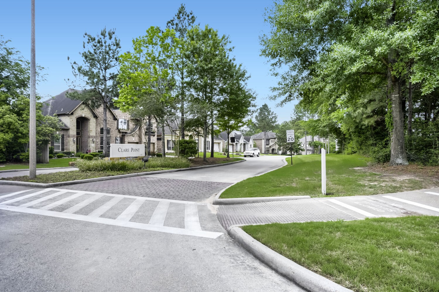 11 Spotted Lily Way The Woodlands, TX 77354 - Photo 2 of 30 a house view with garden space