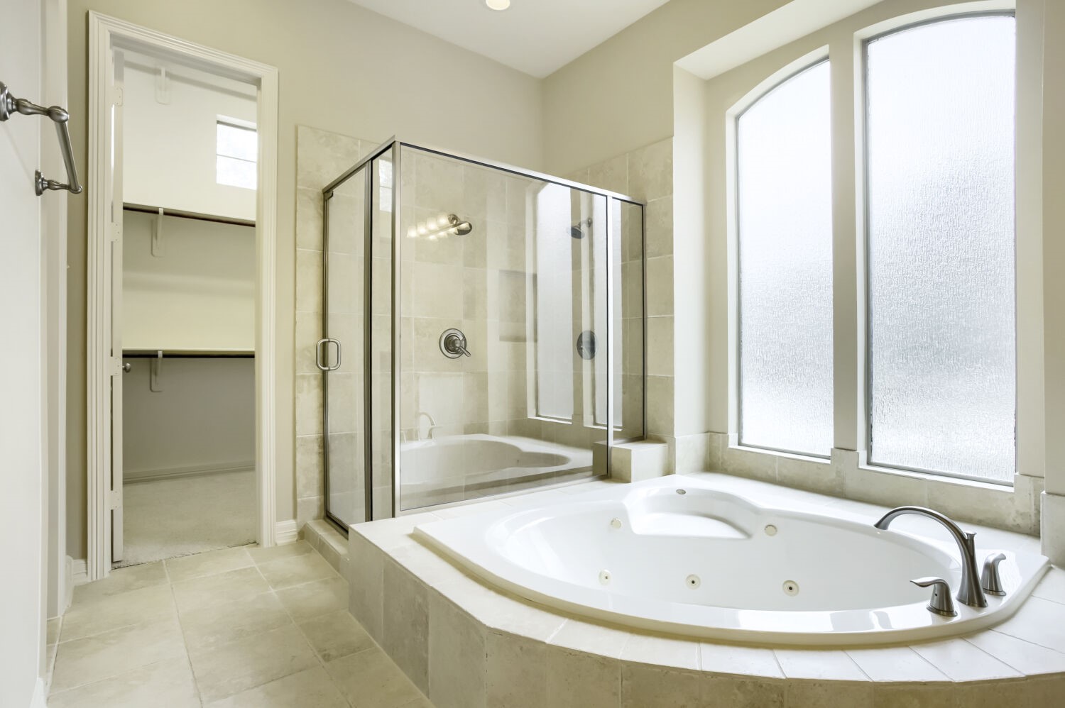 11 Spotted Lily Way The Woodlands, TX 77354 - Photo 21 of 30 a bathroom with a tub and shower