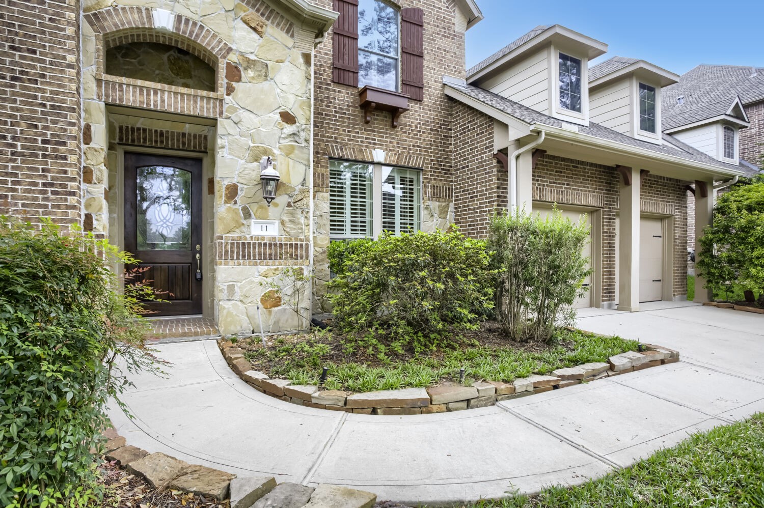 11 Spotted Lily Way The Woodlands, TX 77354 - Photo 4 of 30 front view of a house