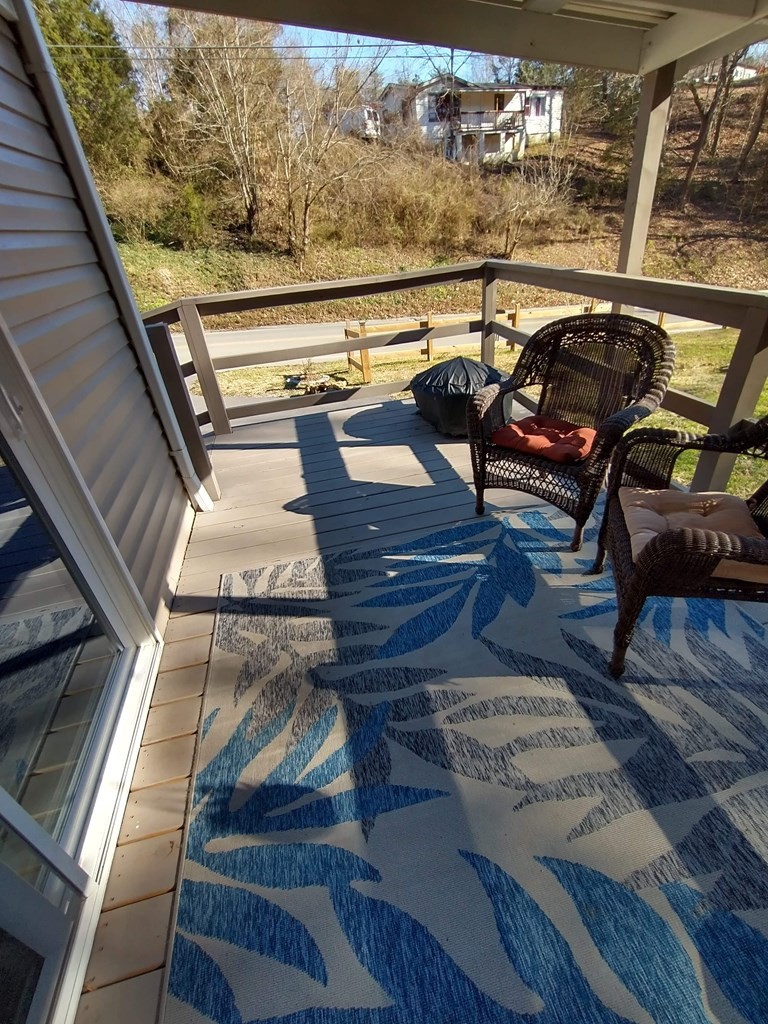 2438 Ridge Road Pigeon Forge, TN 37863 - Photo 5 of 37 a view of a balcony with chairs