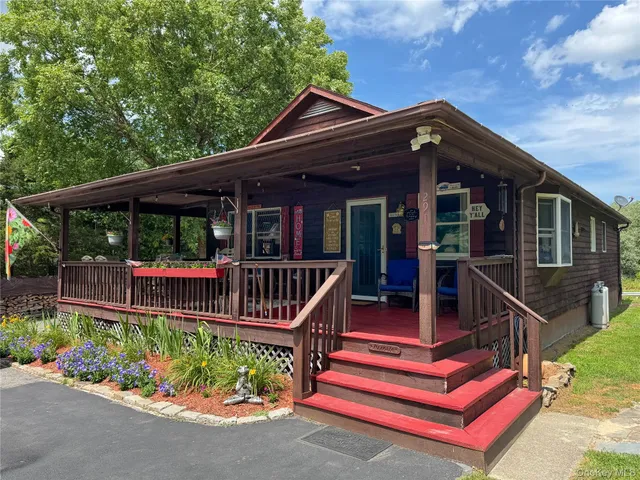 front view of a house with a deck