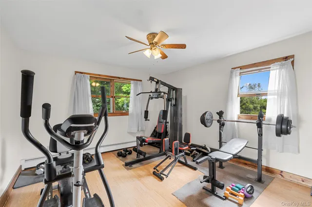 a bedroom with a bed and a view of bathroom
