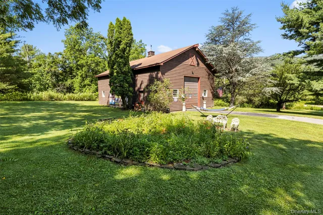a view of a patio with a table chairs and a table