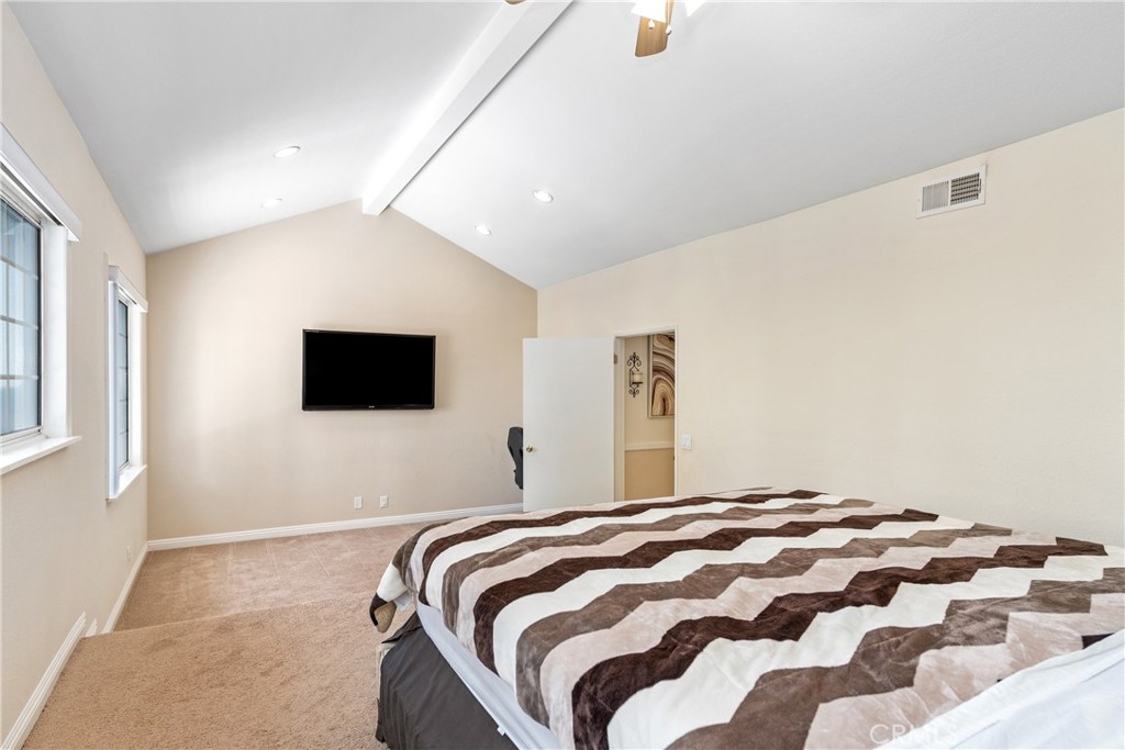2508 Royale Place Fullerton, CA 92833 - Photo 28 of 53 a bedroom with a bed and a flat screen tv
