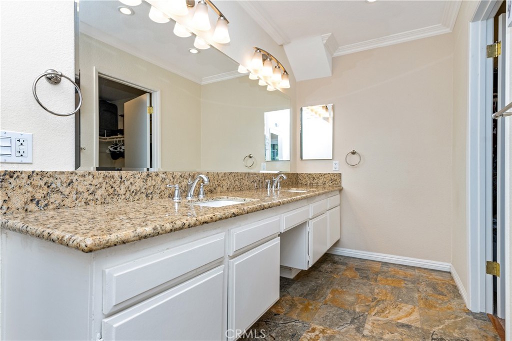 2508 Royale Place Fullerton, CA 92833 - Photo 33 of 53 a bathroom with a granite countertop sink and a mirror