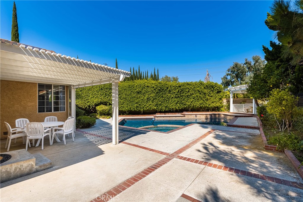 2508 Royale Place Fullerton, CA 92833 - Photo 39 of 53 a view of a patio with table and chairs and potted plants