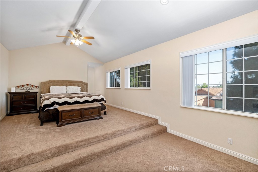 2508 Royale Place Fullerton, CA 92833 - Photo 5 of 53 a bedroom with a bed and a chandelier