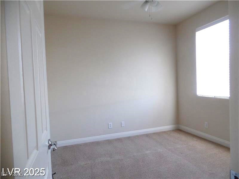 118 Castle Course Avenue Las Vegas, NV 89148 - Photo 19 of 56 Unfurnished room with light carpet and ceiling fan