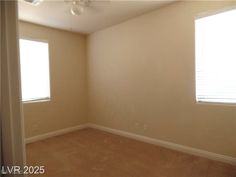 118 Castle Course Avenue Las Vegas, NV 89148 - Photo 20 of 56 Empty room with carpet flooring and ceiling fan