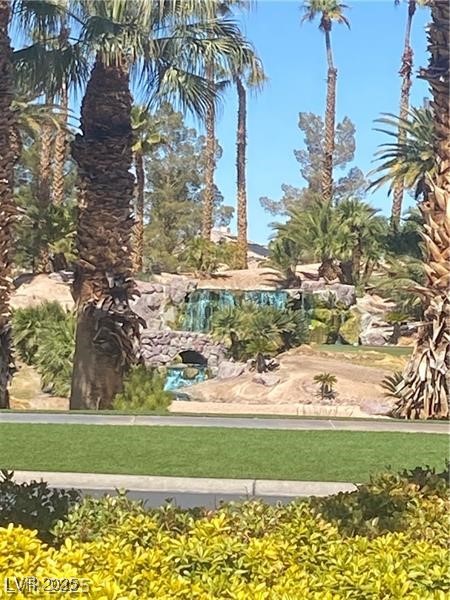 118 Castle Course Avenue Las Vegas, NV 89148 - Photo 2 of 56 View of community featuring a yard