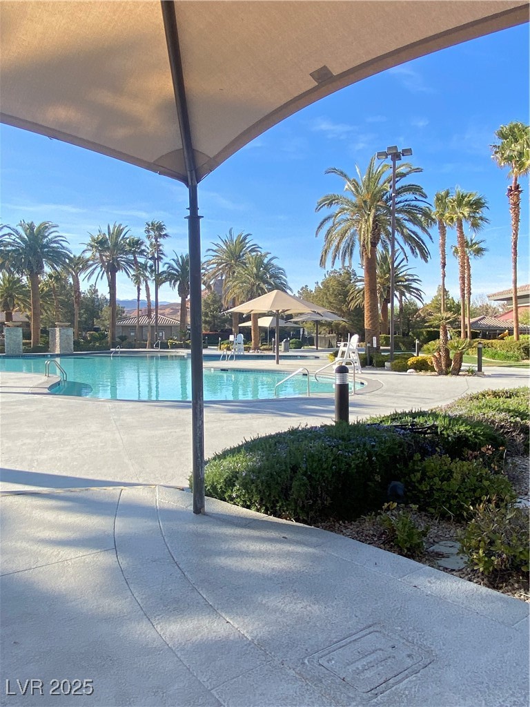 118 Castle Course Avenue Las Vegas, NV 89148 - Photo 24 of 56 Community pool with a patio