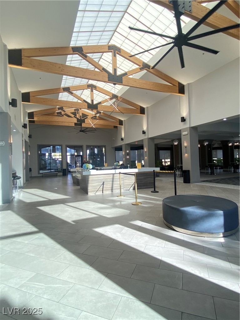 118 Castle Course Avenue Las Vegas, NV 89148 - Photo 26 of 56 Community lobby with high vaulted ceiling and beamed ceiling