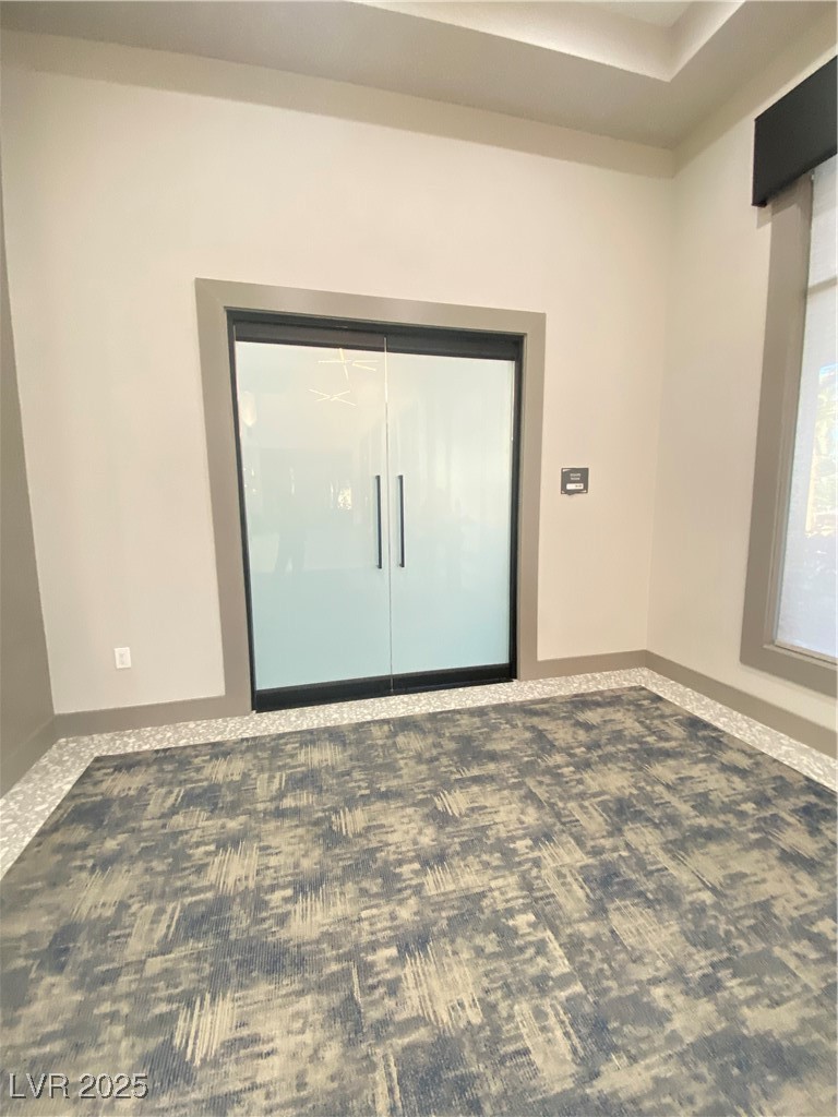 118 Castle Course Avenue Las Vegas, NV 89148 - Photo 39 of 56 Carpeted spare room featuring baseboards