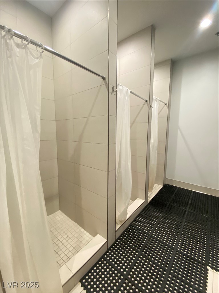 118 Castle Course Avenue Las Vegas, NV 89148 - Photo 47 of 56 Full bath featuring a stall shower and baseboards