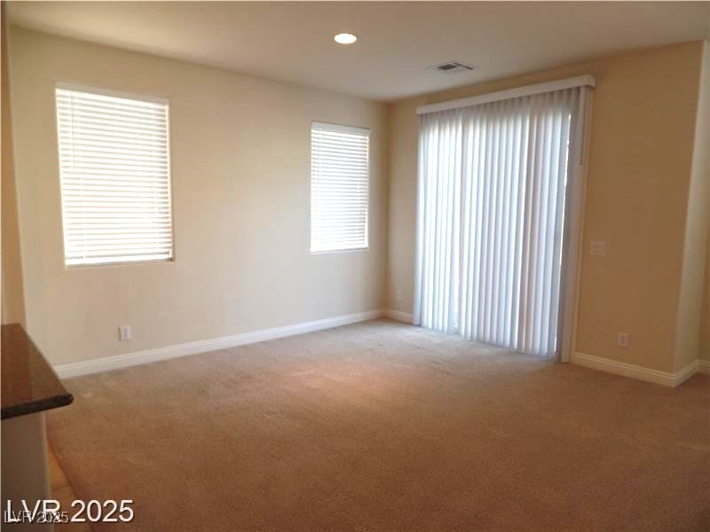 118 Castle Course Avenue Las Vegas, NV 89148 - Photo 7 of 56 Spare room featuring light carpet and recessed lighting