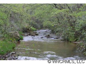 999 Edgerton Road Mill Spring, NC 28756 - Photo 1 of 12 a view of a lake view