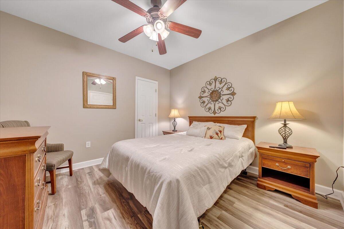 1273 Graves Harbor Trail, Unit 347 Huddleston, VA 24104 - Photo 18 of 63 a bedroom with bed and wooden floor