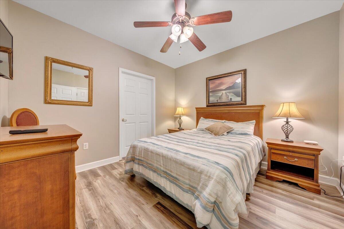 1273 Graves Harbor Trail, Unit 347 Huddleston, VA 24104 - Photo 22 of 63 a bedroom with a bed and a chandelier