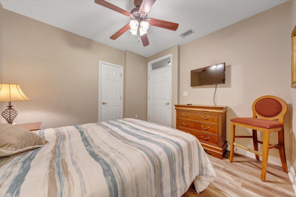 1273 Graves Harbor Trail, Unit 347 Huddleston, VA 24104 - Photo 23 of 63 a bedroom with a bed and a flat screen tv