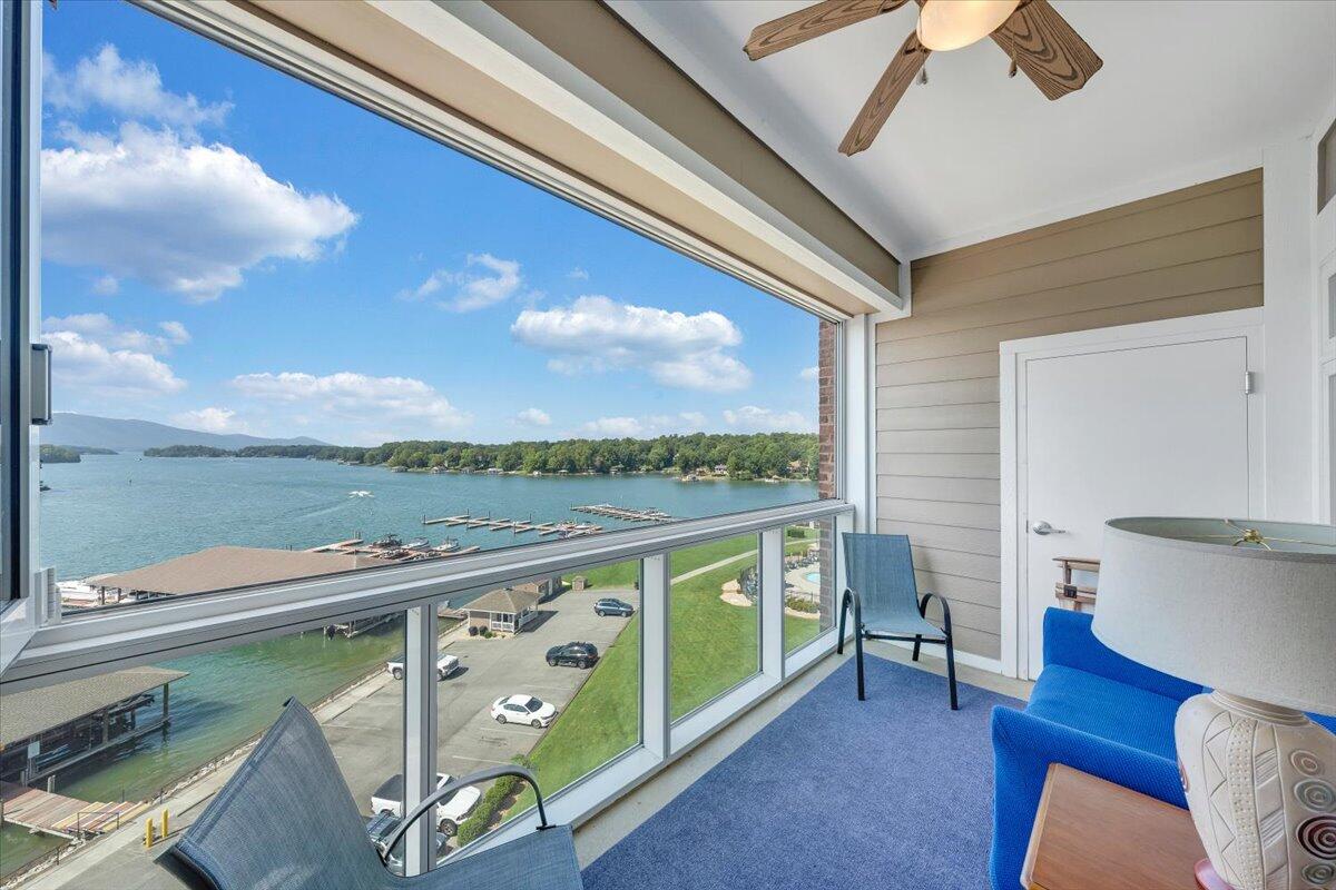 1273 Graves Harbor Trail, Unit 347 Huddleston, VA 24104 - Photo 3 of 63 a view of a balcony with furniture and a kitchen view