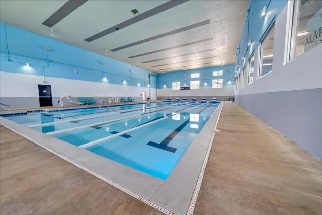 a view of a yard with cars park