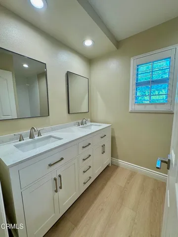 a bathroom with a toilet and a bath tub