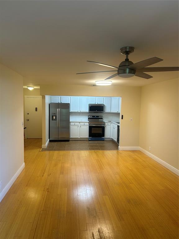 4116 Northwest 88th Avenue, Unit 202 Coral Springs, FL 33065 - Photo 7 of 16 a view of empty room with a kitchen