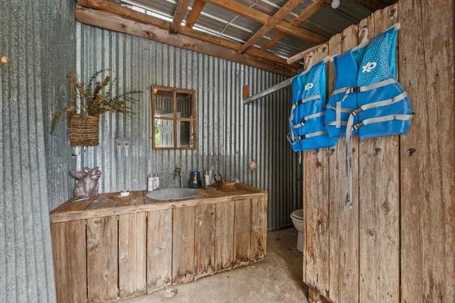 a bathroom with a sink and a shower
