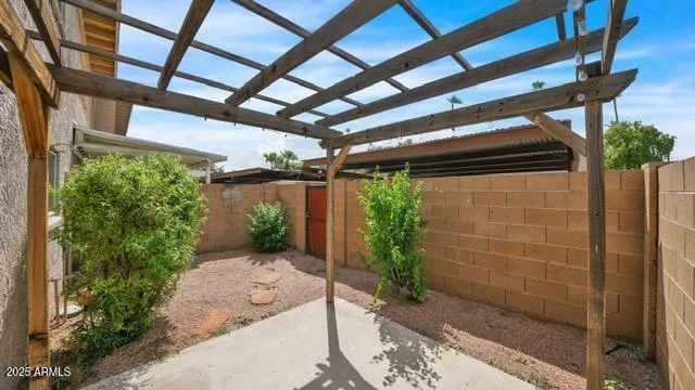 a kitchen with stainless steel appliances kitchen island granite countertop a stove a sink and a refrigerator