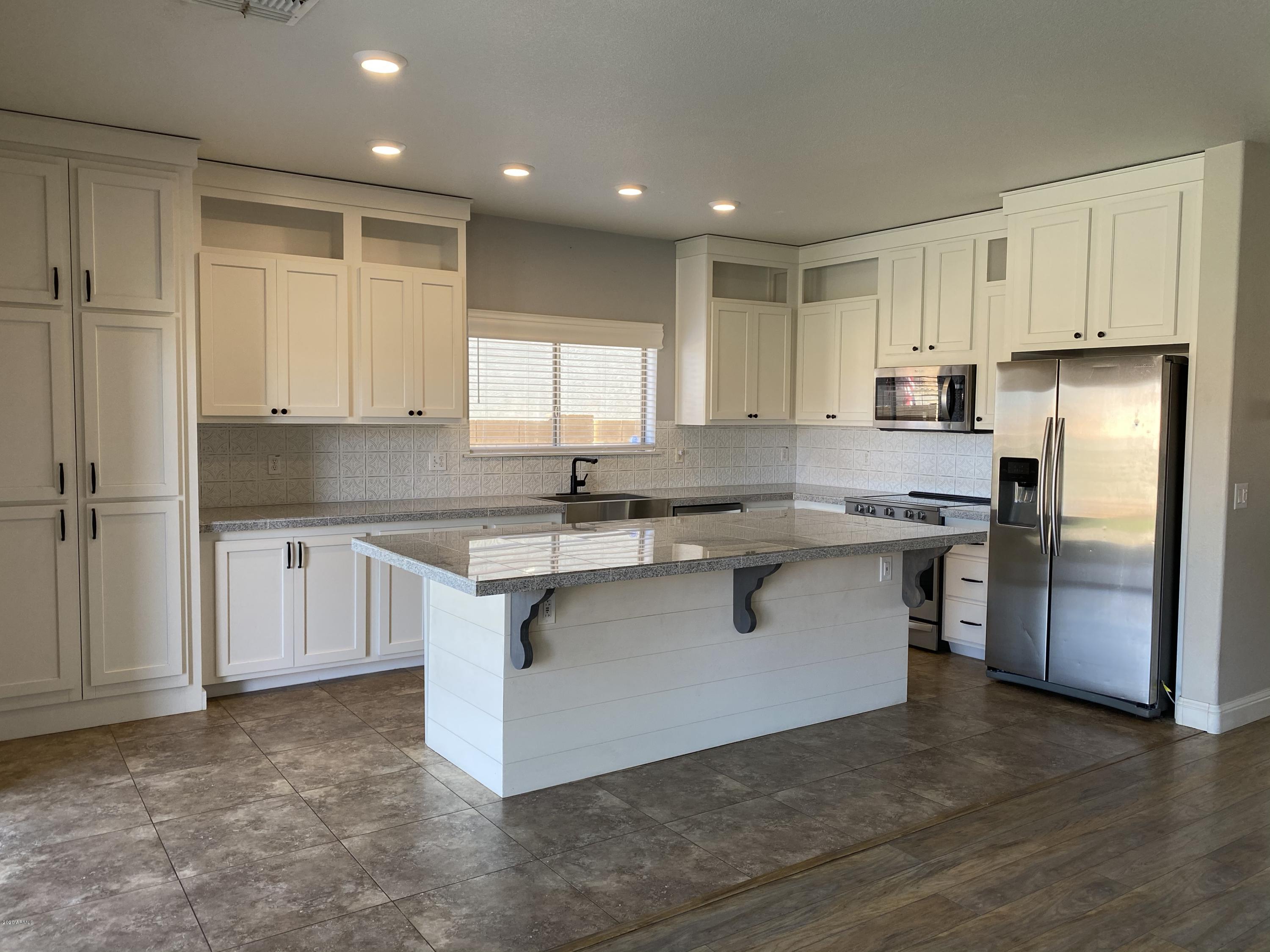 2948 West Tanner Ranch Road Queen Creek, AZ 85144 - Photo 3 of 5 Custom cabinetry