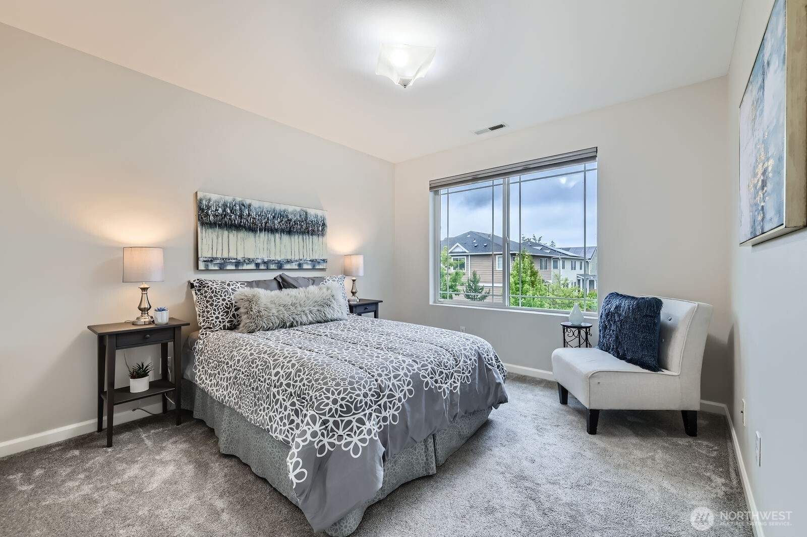 3720 195th Place Southeast Bothell, WA 98012 - Photo 20 of 32 a bedroom with a bed and a couch